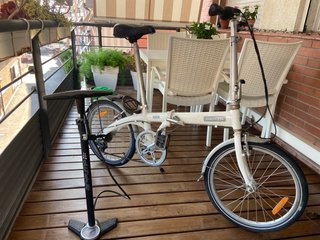 Bicicleta plegable Dahon blanca +mancha