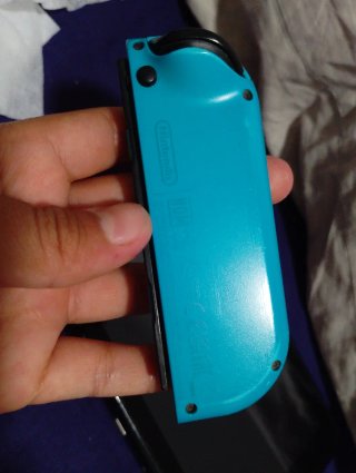 Nintendo switch esta usada solo le falta el botón