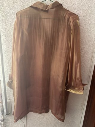 Chaqueta transparente con hombreras