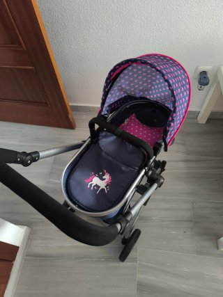 Carrito de muñecas con unicornio