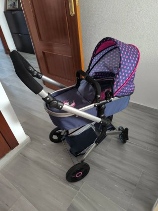 Carrito de muñecas con unicornio