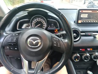Mazda 2 2015 Rojo en perfecto estado
