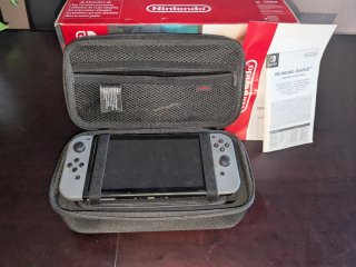 Nintendo Switch 1 Gris y Negro + Estuche