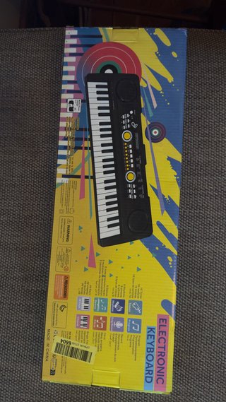 Tastiere elettroniche per bambini con microfono