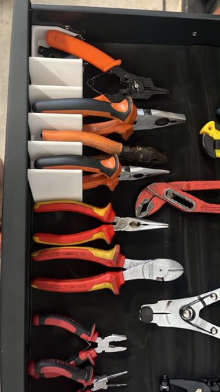 Organizador de herramientas para 8 alicates
