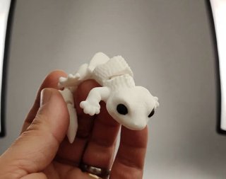 Lagarto articulado blanco