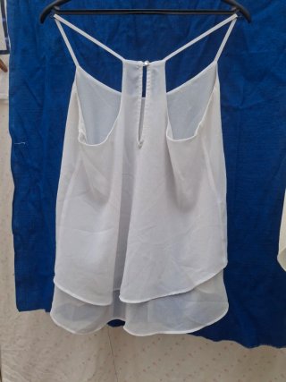 Blusa T S. Medidas en descripción