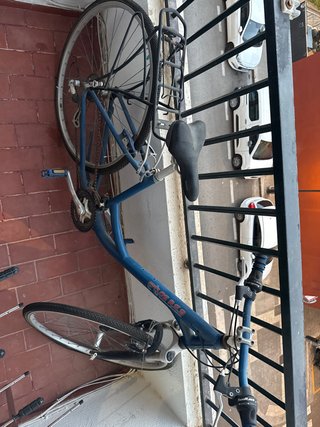 Bicicleta azul marca CROSS