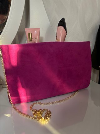 Cartera de mano rosa