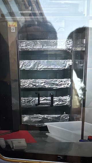 Máquina de pollos asados.