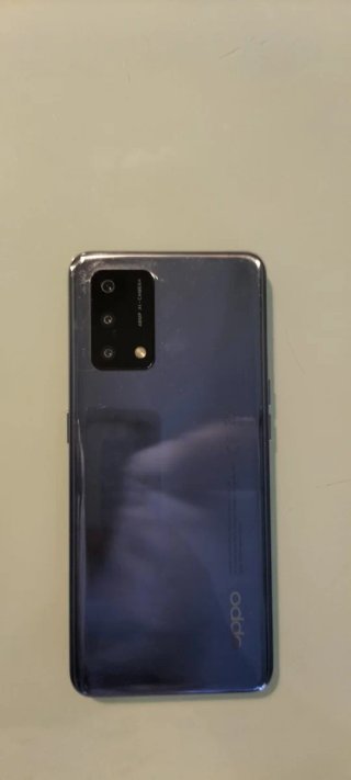Oppo A74 4G en su caja