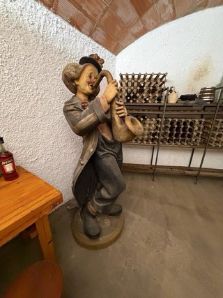Payaso saxofonista decorativo tamaño real