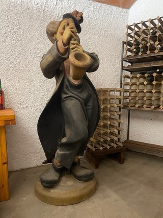Payaso saxofonista decorativo tamaño real