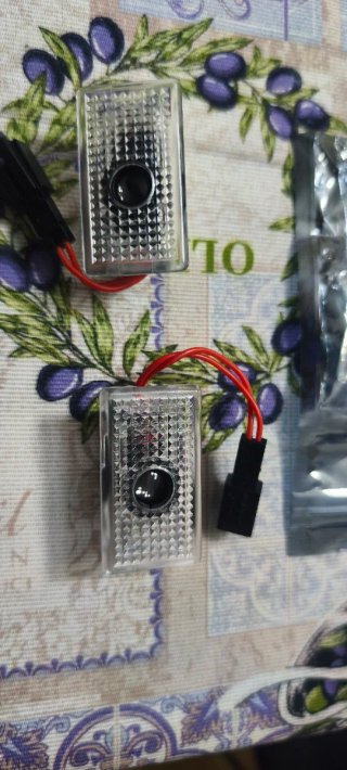 Luces cortesia Proyector Logo Tesla Model 3