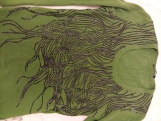 Jersey verde con pedrería