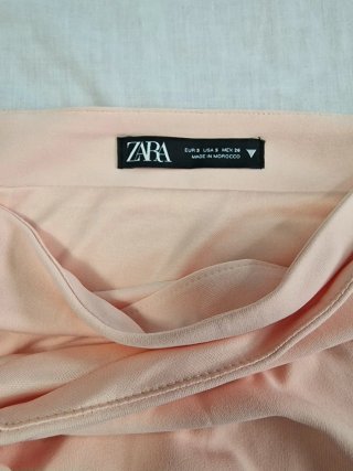 Falda rosa drapeada