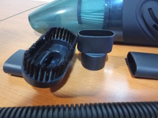 Aspirador de mano con accesorios