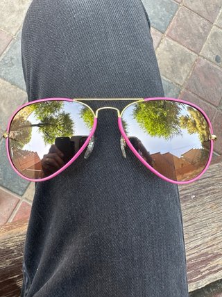 Gafas Ray-Ban rosas y doradas