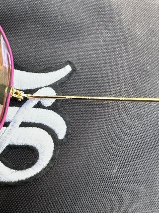 Gafas Ray-Ban rosas y doradas