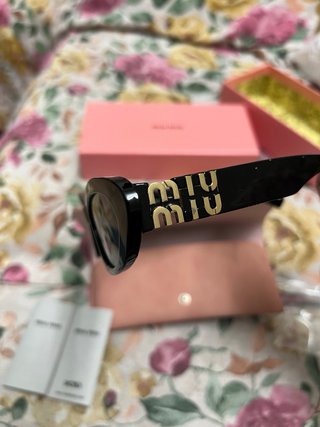 Gafas de Sol Miu Miu SMU09WS Negras