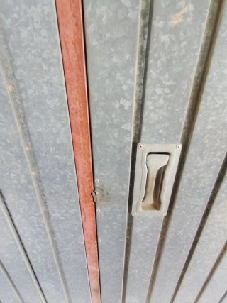 Puerta corredera garaje dos hojas