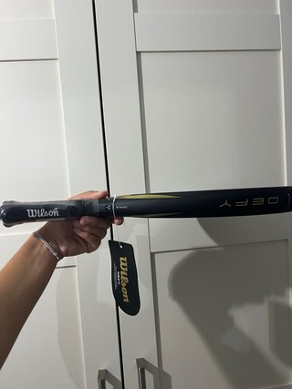 Pala Wilson Defy V1 Negra y Dorada