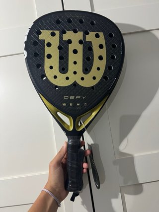 Pala Wilson Defy V1 Negra y Dorada
