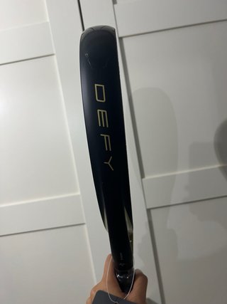 Pala Wilson Defy V1 Negra y Dorada