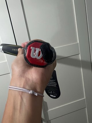 Pala Wilson Defy V1 Negra y Dorada