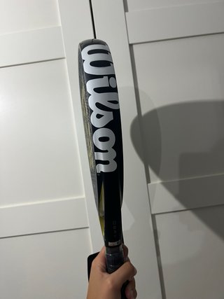 Pala Wilson Defy V1 Negra y Dorada