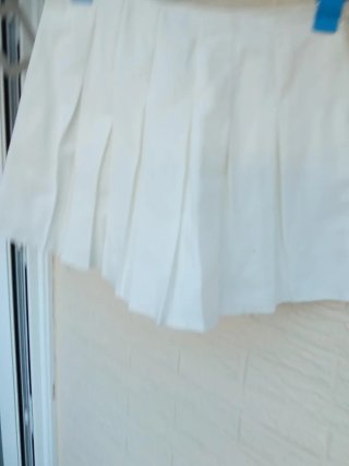Falda corta blanca plisada talla 36