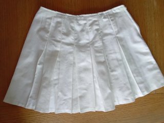Falda corta blanca plisada talla 36