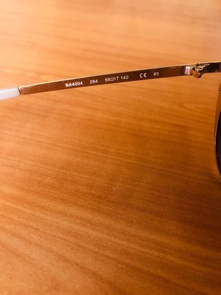 Gafas de sol BCBG Max Azria doradas y blancas
