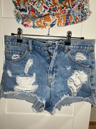 Top floral y shorts vaqueros