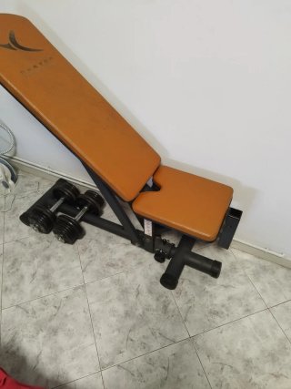 Banco de pesas con 2 pesas de 20kg cada una