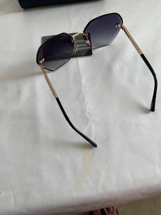 Occhiali da sole Chopard dorati e viola