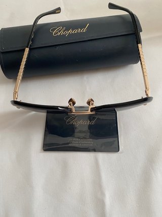 Occhiali da sole Chopard dorati e viola