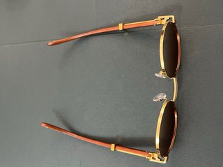Gafas de sol ovaladas doradas y marrones