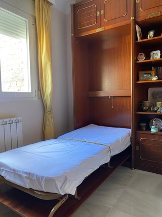 2 Camas Plegables con Mueble