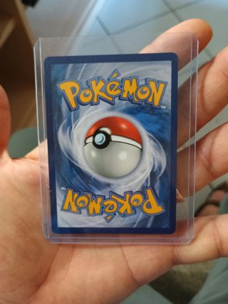 Carta Pokémon Strumento Gong di Lotta