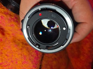 Canon FD 50mm f1.4 con tapas