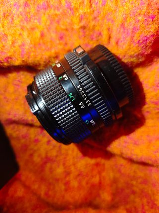 Canon FD 50mm f1.4 con tapas