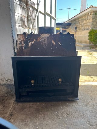 Hogar de leña metálico
