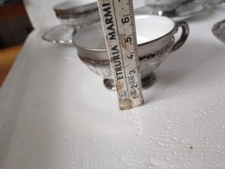 Servizio porcellana vintage argento e bianco.