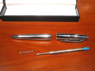Sauro Fiorini: Penne. Resina brillante e cromo.