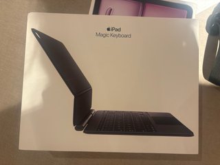 iPad Air Morado Nuevo con teclado magico