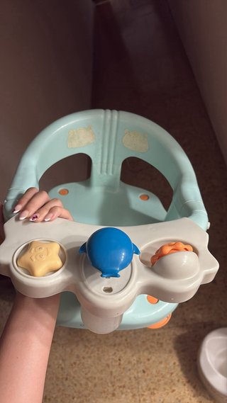 Asiento de baño para bebé con juguetes