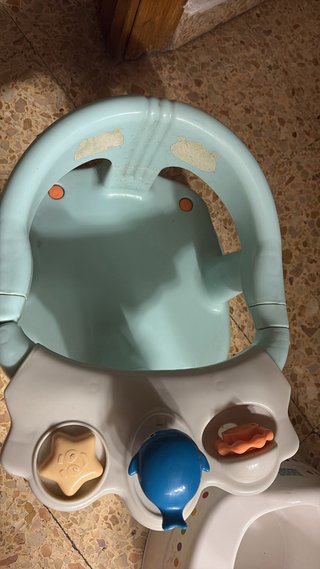 Asiento de baño para bebé con juguetes
