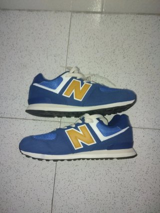Zapatillas New Balance niño azul y dorado