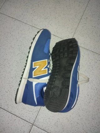 Zapatillas New Balance niño azul y dorado